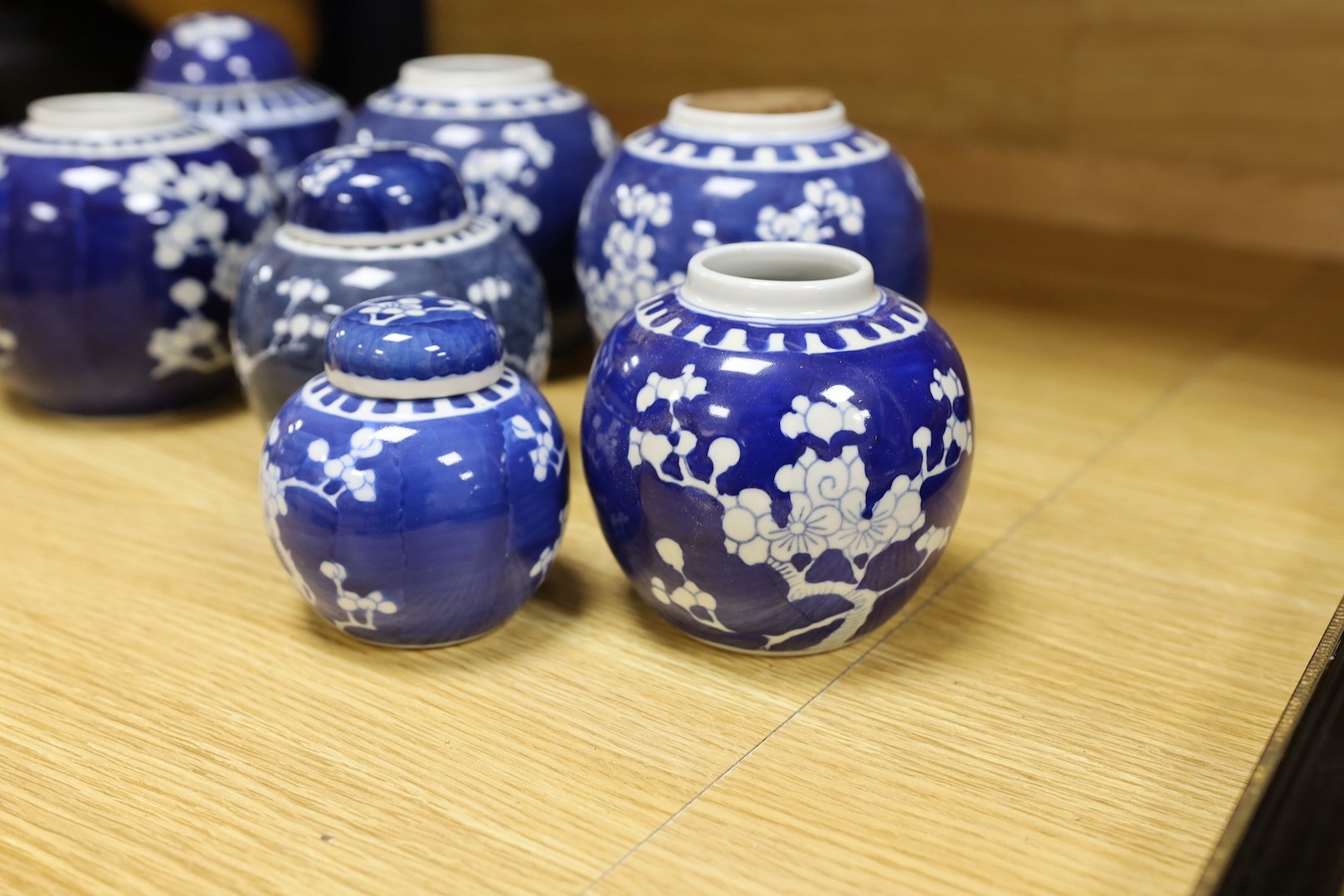 Nine Chinese blue and white ‘prunus blossom’ ginger jars